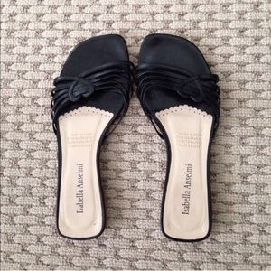 Black leather sandals with heart detail